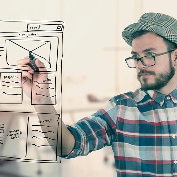 A man creating sitemap for custom web design/development services in india