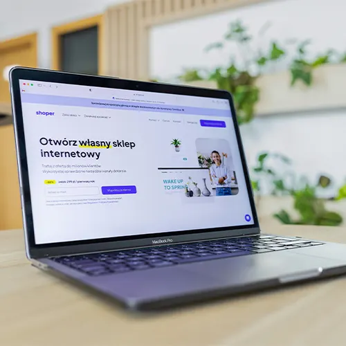 E-commerce website displayed on laptop showcasing online web store design and development  services by iOnethink in <br> Punjab, India.